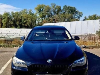 Second-hand BMW 520 184 CP (135 kW) 2011 Negru Berlinǎ