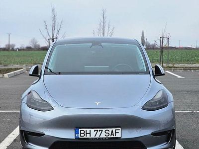 Second-hand Tesla Model Y Performance 392 kW (534 CP) 2023 Culoareargint SUV