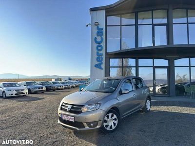 Second-hand Dacia Sandero Lauréate 90 CP (66 kW) 2014 Culoareyellowgold Hatchback