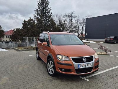 Second-hand VW Touran Cross 105 CP (77 kW) 2007 Culoareportocaliu Monovolum