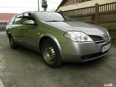 Second-hand Nissan Primera 139 CP (102 kW) 2004 Auriu Break