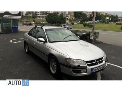 Second-hand Opel Omega 144 CP (105 kW) 1999 Gri Berlinǎ