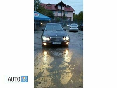 Second-hand Mercedes E270 150 CP (110 kW) 2003 Negru Berlinǎ