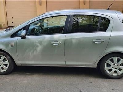 Second-hand Opel Corsa 59 CP (43 kW) 2010 Argintiu Berlinǎ