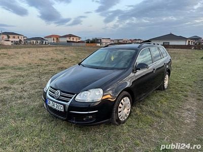 Second-hand VW Golf V 105 CP (77 kW) 2009 Portocaliu Break