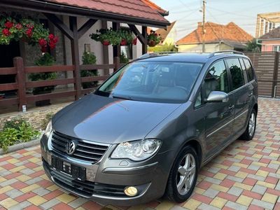 second-hand VW Touran 2010 1.9TDI crom piele bi xenon navi plus