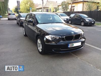 Second-hand BMW 118 143 CP (105 kW) 2009 Negru Hatchback