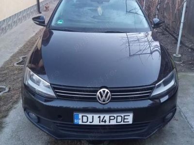 Second-hand VW Jetta 105 CP (77 kW) 2011 Negru Berlinǎ