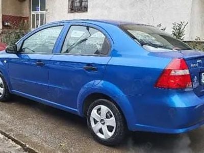 Second-hand Chevrolet Aveo 65 CP (47 kW) 2011 Albastru Berlinǎ