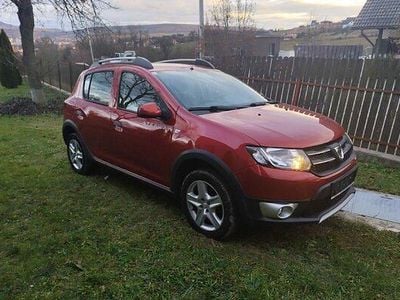 Second-hand Dacia Sandero Stepway 90 CP (66 kW) 2015 Roşu Berlinǎ