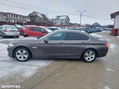 Second-hand BMW 520 Sport Line 184 CP (135 kW) 2011 Culoaremaro Berlinǎ
