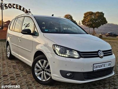 Second-hand VW Touran Style 105 CP (77 kW) 2011 Alb Monovolum