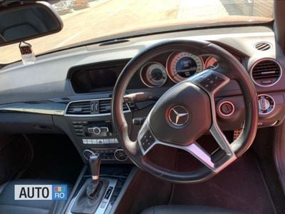Second-hand Mercedes C180 156 CP (114 kW) 2013 Rosu Coupe