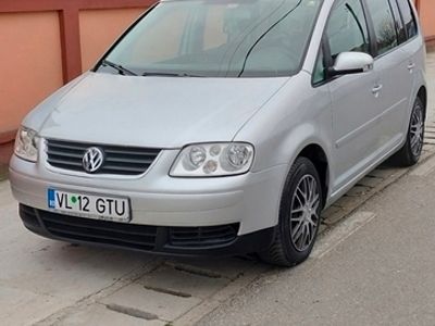 second-hand VW Touran 1.9 TDI 7 LOCURI