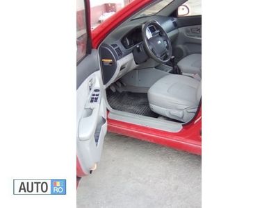 Second-hand Kia Cerato 110 CP (80 kW) 2007 Rosu Berlinǎ