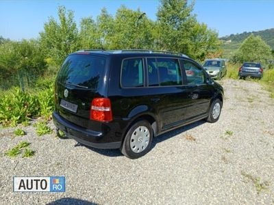 Second-hand VW Touran 105 CP (77 kW) 2006 Negru Monovolum
