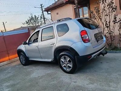 Second-hand Dacia Duster 110 CP (80 kW) 2014 Argintiu SUV