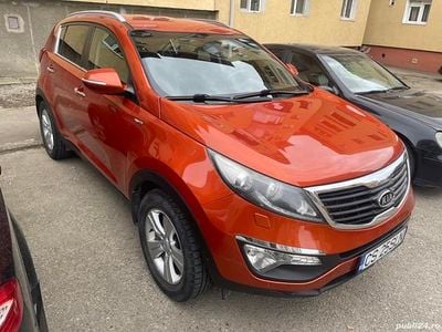 Second-hand Kia Sportage 184 CP (135 kW) 2013 Portocaliu SUV