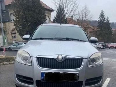 Second-hand Skoda Roomster Comfort 70 CP (51 kW) 2009 Culoareargint Monovolum