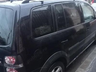 Second-hand VW Touran 103 CP (75 kW) 2010 Negru Monovolum