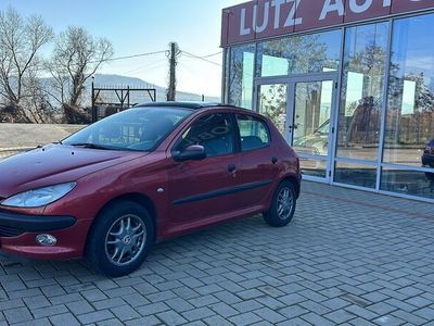 Rosu metalizat Utilizat 2001 Peugeot 206 Hatchback | 1.599 EUR