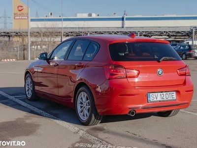 Second-hand BMW 118 Sport Line 150 CP (110 kW) 2017 Culoarerosu Hatchback