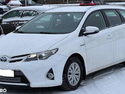 Second-hand Toyota Auris Hybrid Luna 99 CP (72 kW) 2014 Culoarealb Break