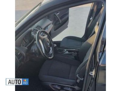 Second-hand BMW 116 115 CP (84 kW) 2007 Negru Hatchback