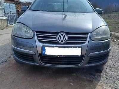 Second-hand VW Jetta 105 CP (77 kW) 2009 Gri Berlinǎ