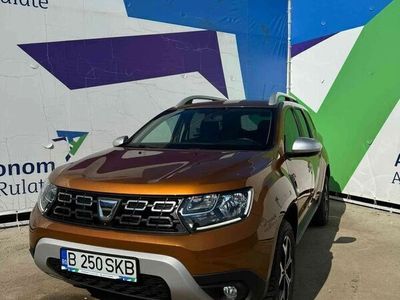 second-hand Dacia Duster TCe 150 GPF 4WD SL Orange