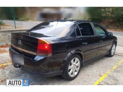 Second-hand Opel Vectra 125 CP (91 kW) 2002 Negru Berlinǎ