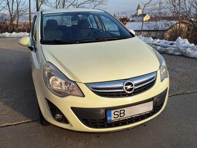 Second-hand Opel Corsa Enjoy 100 CP (73 kW) 2011 Culoarealb Hatchback