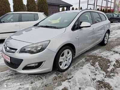 Second-hand Opel Astra 110 CP (80 kW) 2012 Argintiu Break