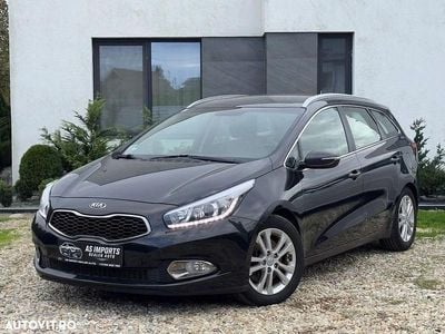Second-hand Kia Ceed 90 CP (66 kW) 2014 Culoarenegru Hatchback