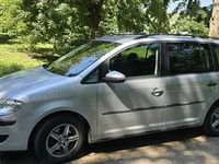 Second-hand VW Touran 104 CP (76 kW) 2010 Argintiu Monovolum