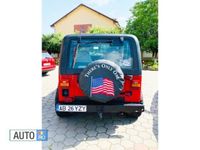Second-hand Jeep Wrangler 130 CP (95 kW) 1993 Rosu SUV