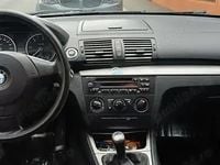Second-hand BMW 116 116 CP (85 kW) 2010 Negru Hatchback