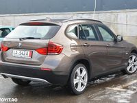 Second-hand BMW X1 Sport Line 143 CP (105 kW) 2011 Culoaremaro SUV