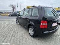 second-hand VW Touran 2.0TDI Highline Aut