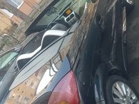 Second-hand Opel Tigra 125 CP (91 kW) 2005 Negru Cabrio