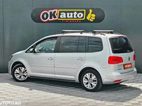 Second-hand VW Touran 105 CP (77 kW) 2013 Culoareargint Monovolum