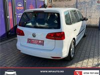 Second-hand VW Touran Comfortline 105 CP (77 kW) 2011 Culoarealb Monovolum