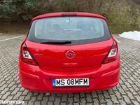 Second-hand Opel Corsa Edition 90 CP (66 kW) 2009 Culoarerosu Hatchback