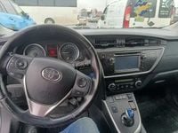 Second-hand Toyota Auris Hybrid 132 CP (97 kW) 2015 Hatchback