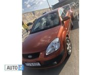 Second-hand Kia Rio 110 CP (80 kW) 2006 Portocaliu Berlinǎ