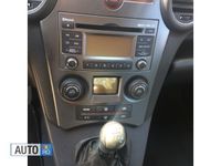 Second-hand Kia Carens 115 CP (84 kW) 2011 Negru Monovolum