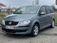 Second-hand VW Touran 105 CP (77 kW) 2009 Gri Monovolum