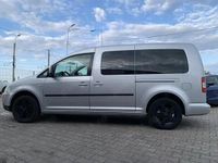 Second-hand VW Caddy Maxi Life 105 CP (77 kW) 2010 Argintiu Monovolum