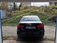 Second-hand VW Jetta 105 CP (77 kW) 2013 Negru Berlinǎ