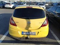Second-hand Opel Corsa 88 CP (64 kW) 2012 Galben Berlinǎ